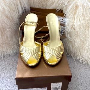 Gucci leather gold sandels with straps